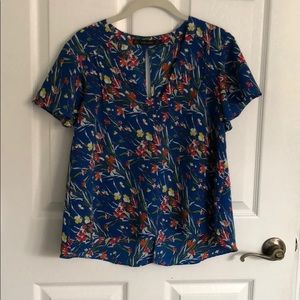 Blue cap sleeve shirt